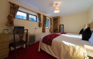 Postel nebo postele na pokoji v ubytování Aisleigh Guest House