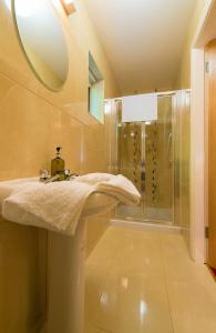 a bathroom with a sink and a shower at Aisleigh Guest House in Carrick on Shannon