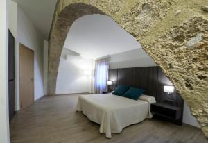 Postel nebo postele na pokoji v ubytování Mas Pere Pau + 37 fotografií