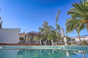 The swimming pool at or close to Villa El Hogar