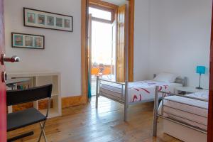 Postel nebo postele na pokoji v ubytování This Is Lisbon Hostel