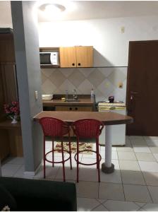 מטבח או מטבחון ב-Condomínio Vila do Mar Suites