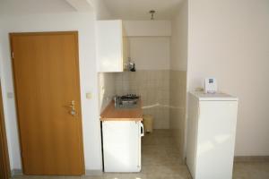 Kuchyň nebo kuchyňský kout v ubytování Apartments Davor & Marija Sosic