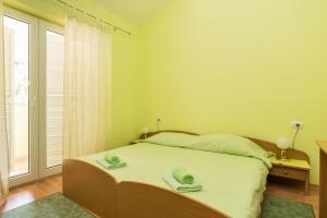 Postel nebo postele na pokoji v ubytování Villa Punta Viktory + 36 fotografií