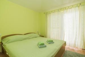 Postel nebo postele na pokoji v ubytování Villa Punta Viktory