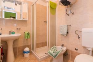 Koupelna v ubytování Villa Punta Viktory