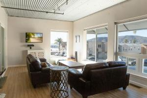 a living room with a couch and a table at 90 San Luis Street Unit B in Avila Beach