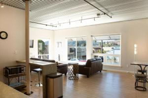 a living room with a couch and a table at 90 San Luis Street Unit B in Avila Beach