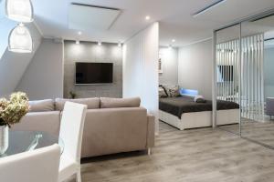 Posedenie v ubytovaní Nowoczesny apartament Gliwice - 200 metrów od rynku