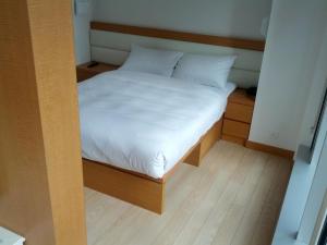 Voodi või voodid majutusasutuse Mia Casa Hotel toas