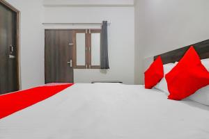 Postel nebo postele na pokoji v ubytování Rajlakshmi Guest House