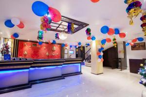 a dance floor with blue and red balloons at HOTEL SURYA INTERNATIONAL in New Delhi
