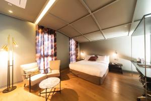 Hotel Museo Cheongju客房内的一张或多张床位