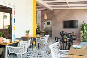 TV a/nebo společenská místnost v ubytování Dara Al Yammamah Hotel - Formerly Nuzl Shada