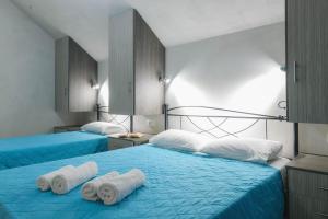 Кровать или кровати в номере Studio Timotheos
