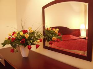 Posteľ alebo postele v izbe v ubytovaní Matejko Hotel