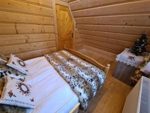 Posteľ alebo postele v izbe v ubytovaní Alpinka
