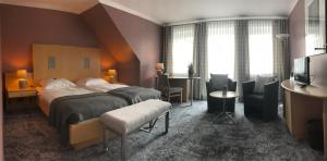 Postel nebo postele na pokoji v ubytování Hotel & Restaurant Prüser´s Gasthof