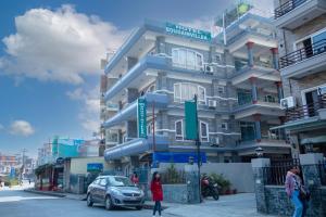 El barrio en el que está el hotel o un barrio cercano
