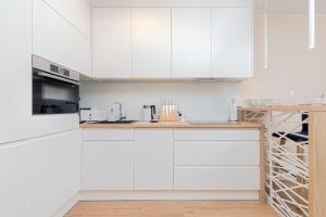 Kuchyňa alebo kuchynka v ubytovaní Apartment Awanport Gdynia Żeromskiego by Noclegi Renters