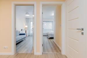 Posteľ alebo postele v izbe v ubytovaní Apartment Awanport Gdynia Żeromskiego by Noclegi Renters