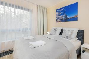 Posteľ alebo postele v izbe v ubytovaní Apartment Awanport Gdynia Żeromskiego by Noclegi Renters