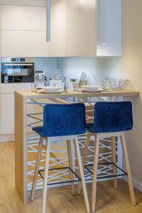 Kuchyňa alebo kuchynka v ubytovaní Apartment Awanport Gdynia Żeromskiego by Noclegi Renters