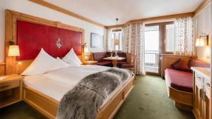 Voodi või voodid majutusasutuse Hotel Almhof toas