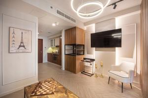 TV a/nebo společenská místnost v ubytování Nasma Luxury Stays - Boulevard Central Tower