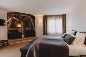 Postel nebo postele na pokoji v ubytování Grand Hotel Belle Vue