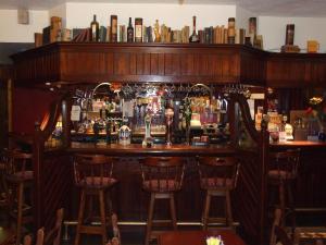 Khu vực lounge/bar tại Murphy's Pub and Bed & Breakfast