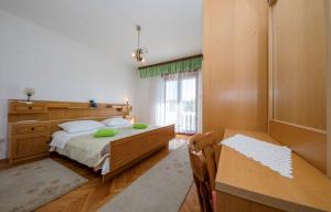 Posteľ alebo postele v izbe v ubytovaní Apartment Ante Kampor