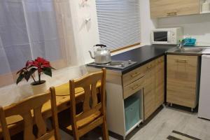 Köök või kööginurk majutusasutuses No°21 Apartman