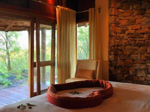 Posteľ alebo postele v izbe v ubytovaní Buffalo Ridge Safari Lodge