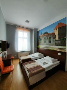 Afbeelding uit fotogalerij van Hotelik w Centrum in Toruń