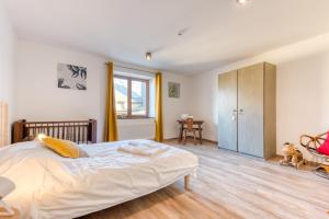 Krevet ili kreveti u jedinici u okviru objekta Gîte de la cascade