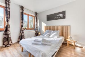 Krevet ili kreveti u jedinici u okviru objekta Gîte de la cascade