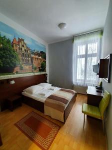 Afbeelding uit fotogalerij van Hotelik w Centrum in Toruń
