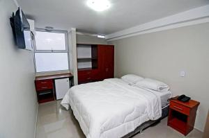 Postel nebo postele na pokoji v ubytování Hotel Plaza Sullana