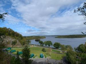 an aerial view of a park next to a lake at Further Space at Carrickreagh Bay Luxury Glamping Pods, Lough Erne in Enniskillen