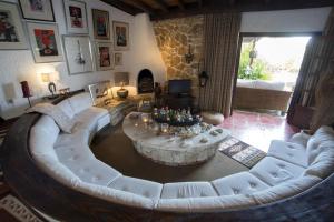 a living room with a large couch and a coffee table at Tritonia in Gaios
