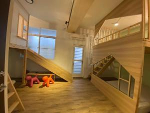 Foto sihtkohas Tainan asuva majutusasutuse 躲貓貓溜滑梯親子包棟民宿 galeriist
