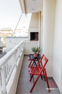 Μπαλκόνι ή βεράντα στο Cozy City Suite