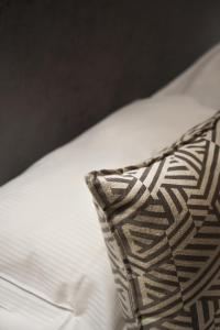 Postel nebo postele na pokoji v ubytování Hôtel Le Roosevelt Lyon
