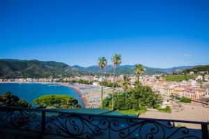 a view of a city from a balcony at Grand Hotel Dei Castelli in Sestri Levante