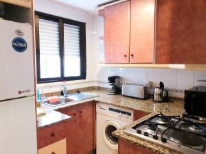Kuchyňa alebo kuchynka v ubytovaní Apartamento Porticada