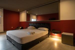 Katil atau katil-katil dalam bilik di Residencial & Hotel Palazzo