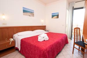Voodi või voodid majutusasutuse Hotel Acrux toas