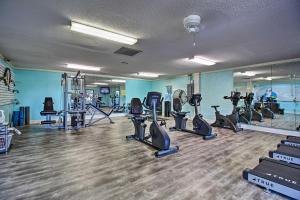 a gym with treadmills and ellipticals in a room at Coastal Condo with Balcony and Luxe Resort Amenities! in Hilton Head Island