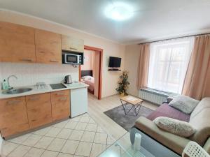 Kuchyňa alebo kuchynka v ubytovaní ApartHouse Apartamenty Centrum - In the city center Near the train station